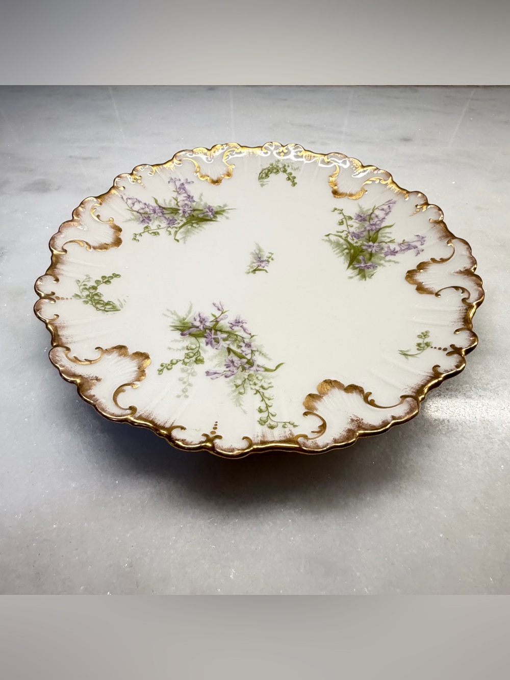 Limoges White Porcelain Plate with Purple Floral Sprays and Gold Trim